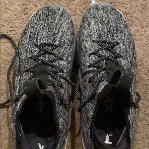 Black and grey Nike Jordan basketball shoes